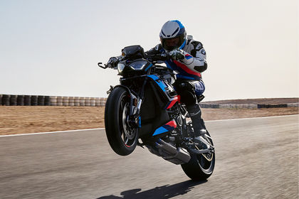BMW M 1000 R Riding: Front Left Quarter View BMW M 1000 R Riding: Front Left Quarter View