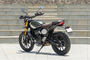 Triumph Scrambler 400 X Rear Left Three Quarter View Triumph Scrambler 400 X Rear Left Three Quarter View