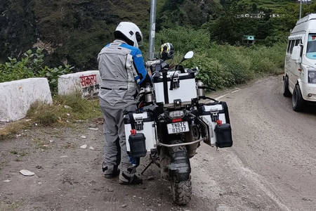 Popular Tamil Actor Ajith Kumar Helps A Stranded Biker 