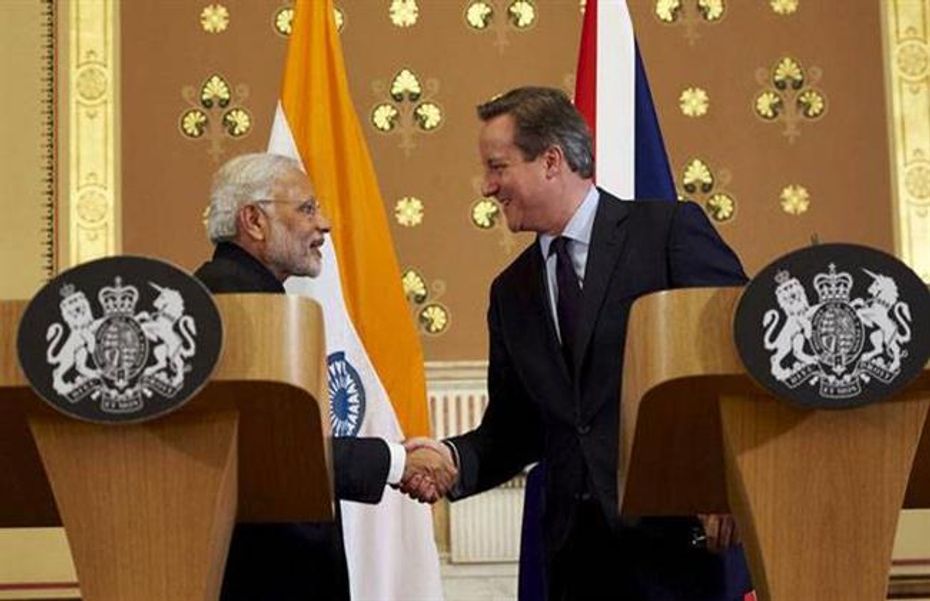 Mr. Narendra Modi and his British counterpart David Cameron Mr. Narendra Modi and his British counterpart David Cameron
