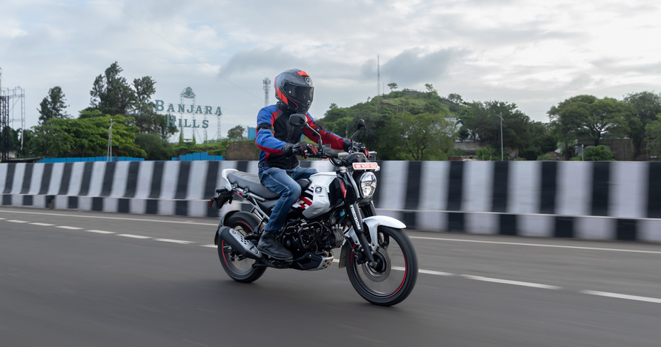 Bajaj Freedom 125 Riding Shot Bajaj Freedom 125 Riding Shot