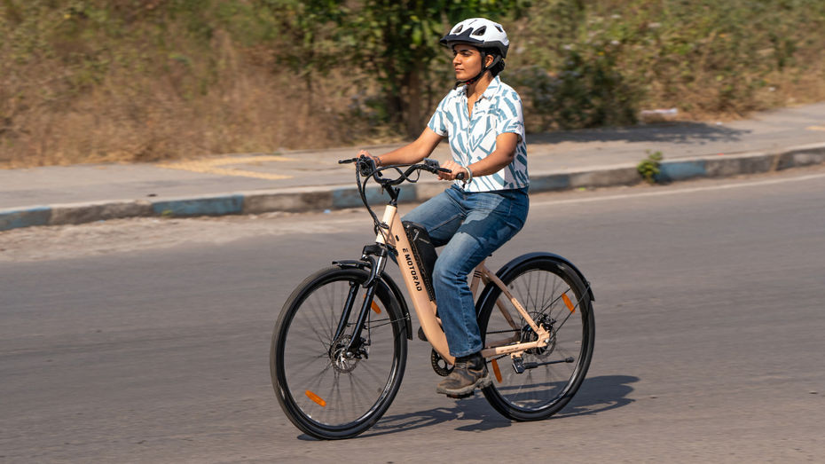 EMotorad ST-X riding a girl riding EMotorad STX e-bike