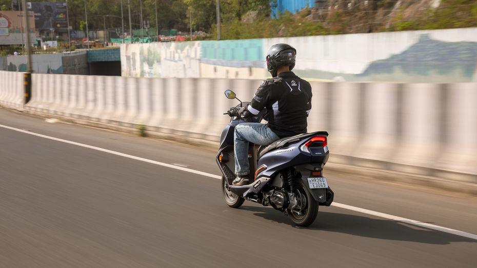 Suzuki Burgman Street Rear Riding Shot Suzuki Burgman Street Rear Riding Shot