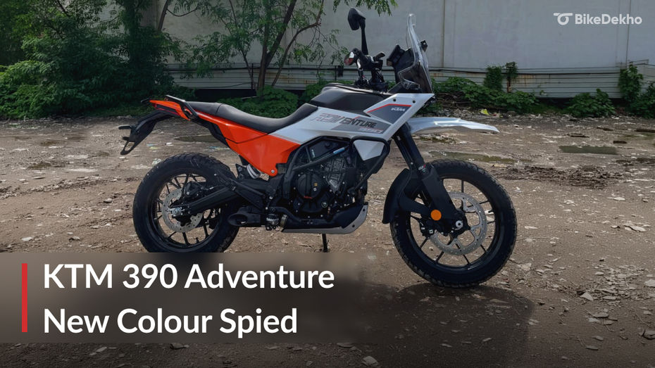 The KTM 390 Adventure has been spotted in a new white colour with refreshed graphics at a dealership. Here’s a closer look. What’s New? The KTM 390 Adventure is currently available in three colour options: Ceramic White, Electronic Orange and Ebony Black. The new colour scheme spotted looks like a graphic update of the existing Ceramic White colour. It gets a white base paint with orange side panels, while the main change is the revised graphics, with ‘Adventure’ written on the side, adding a modern touch to the bike's design. The bike gets a white high-mounted fender, but we can’t see the handguards on this particular bike. However, we can expect it to get black handguards like the current Ceramic White colour. Overall, the updated graphics give the bike a fresh new look, while adding a stylish and modern touch to the ADV’s design. Prices & Rivals The KTM 390 Adventure is currently priced at Rs 2,87,802 (ex-showroom, Delhi), and we expect the new model to be priced the same. Its main competitors are the TVS RTX 300 and the Royal Enfield Himalayan 450. Image Source The KTM 390 Adventure has been spotted in a new white colour with refreshed graphics at a dealership. Here’s a closer look. What’s New? The KTM 390 Adventure is currently available in three colour options: Ceramic White, Electronic Orange and Ebony Black. The new colour scheme spotted looks like a graphic update of the existing Ceramic White colour. It gets a white base paint with orange side panels, while the main change is the revised graphics, with ‘Adventure’ written on the side, adding a modern touch to the bike's design. The bike gets a white high-mounted fender, but we can’t see the handguards on this particular bike. However, we can expect it to get black handguards like the current Ceramic White colour. Overall, the updated graphics give the bike a fresh new look, while adding a stylish and modern touch to the ADV’s design. Prices & Rivals The KTM 390 Adventure is currently priced at Rs 2,87,802 (ex-showroom, Delhi), and we expect the new model to be priced the same. Its main competitors are the TVS RTX 300 and the Royal Enfield Himalayan 450. Image Source