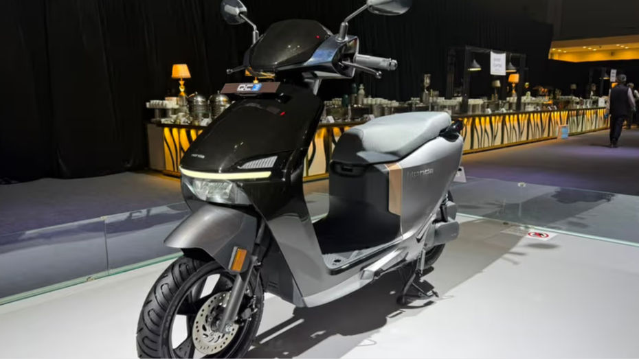 Honda QC3 vs TVS iQube 3.1 kWh: Price Comparison Honda QC3 vs TVS iQube 3.1 kWh: Price Comparison